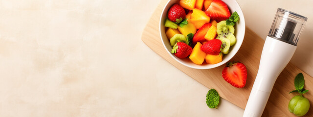 Assorted fresh fruits and a blender ready for a healthy smoothie.