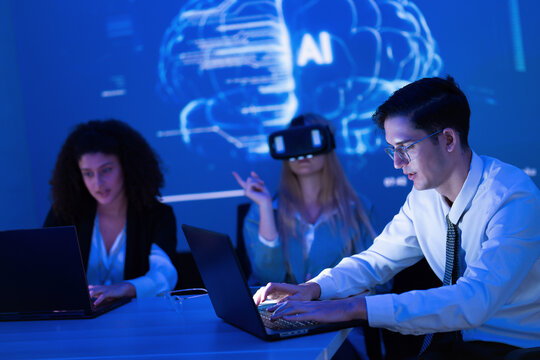 Experts in technology collaborate on artificial intelligence projects in a modern workspace during a daytime meeting - Powered by Adobe