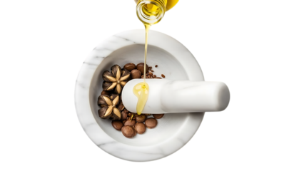 Golden oil pouring onto coffee beans and spices in a marble mortar