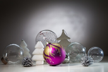 Christmas card with Christmas decorations and transparent balls. With space for text