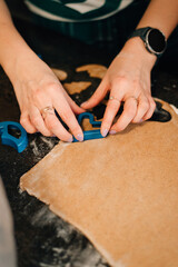 Rolling out gingerbread cookie dough