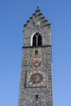 Colourful tower clock with coat of arms, Zw&ouml;lferturm, historic old town, Sterzing, South Tyrol, Italy