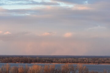 Sunrise over the river in the early morning. Winter fogy landscape