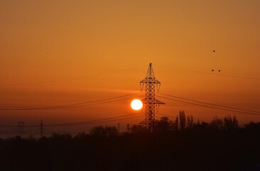 Sunrise over the city in the early morning. Winter fogy landscape