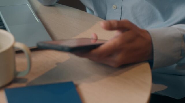 Frustrated anxious worried Indian businessman problem with mobile phone technology Arabian business man furious stress troubled smartphone app notification bank reject at cafe shock employer indoor