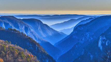 echoing. Sound waves echoing between canyon walls in a misty valley, wide landscape view. travel magazines, destination branding, designed for outdoor magazines and nature guides.
