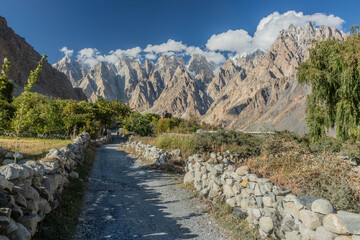 Naklejka premium Path in Hunza valley under Passu (Cathedral) cones, Gilgit-Baltistan region of Pakistan