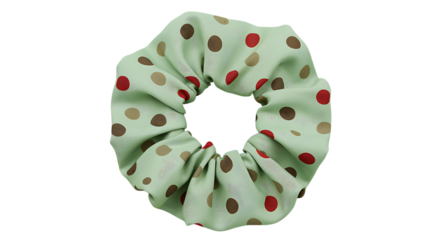 A vibrant green and polka dot scrunchie perfect for hairstyles on transparent background.