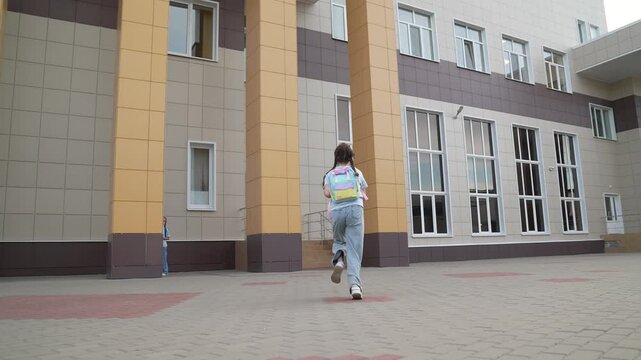 girl rushing to class, children running, child kid with school backpack running to class, school break, education student, running the park girl, education building background, first-grader daughter