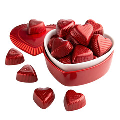 red foil heart shaped chocolates in a red heart shaped bowl with loose candies