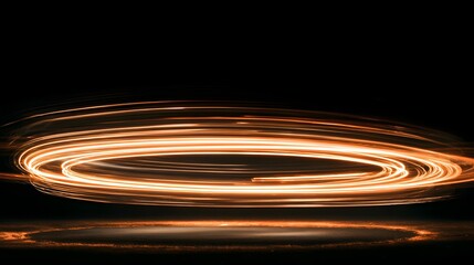 Abstract Light Trails Forming a Circular Swirl on a Dark Background.