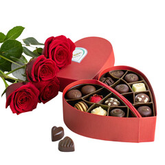 Heart shaped chocolate box with red roses and assorted chocolates