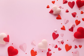Red and pink hearts for Valentine Day greeting card template top view. Festive background for romantic celebration, dating and invitation.