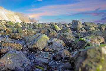 Rocky Baltic Sea coast below steep cliffs