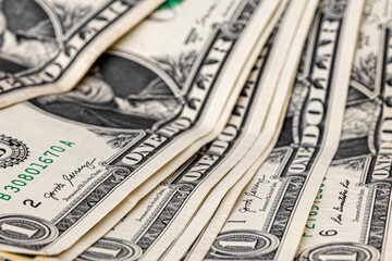 American one dollar banknotes wallpaper. Close up of money. Wealth concept, free trade, business concept background.
close up of one dollar bills.