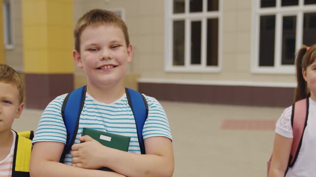 Cheerful children ready for lessons, Early morning happiness, Foundations of friendship, United classmates, Parents proud moments, Hopeful young learners, Kids supporting each other, Road to education