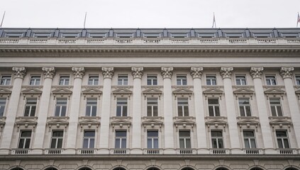 Obraz premium Corner Perspective of Neoclassical Building Exterior with Detailed Cornices and Multiple Rows of Windows