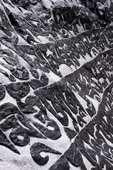 "Om mani padme hum" mantra engraved and painted on a stone. Mani stone in Khumbu region on Everest base camp trek, Nepal.
