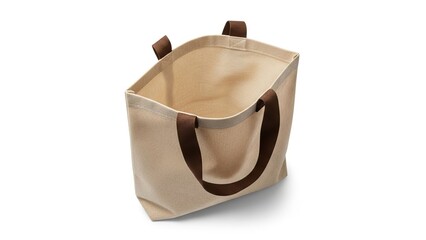 Empty reusable eco-friendly natural burlap shopping bag with brown handles isolated on white background