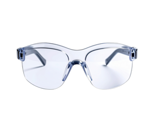 Close-up of transparent protective eyewear, angled slightly, isolated on a black background
