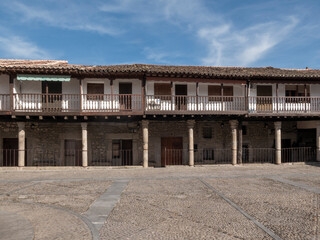 Fototapeta premium Plaza mayor with traditional wooden balconies in spain