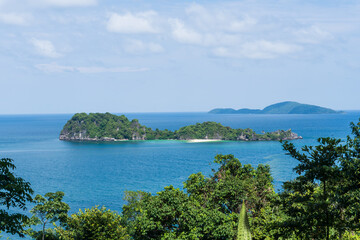 Serene Tropical Island Landscape with Clear Blue Water and Lush Greenery, Thailand