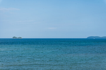 Tranquil Seascape with Calm Blue Waters and Distant Islands