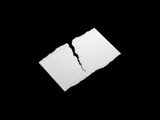 Two torn pieces of white paper with rough edges on black background