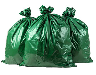 Three tied green plastic bags full of waste