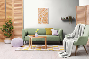 Fototapeta premium Cozy living room with furniture. Interior design with color of 2026 year