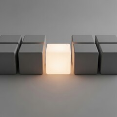 Illuminated cube among dark cubes