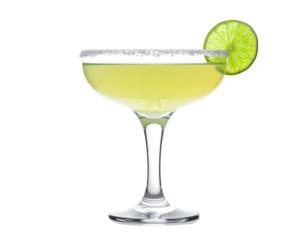 Salty rim coupe glass with pale yellow drink and lime