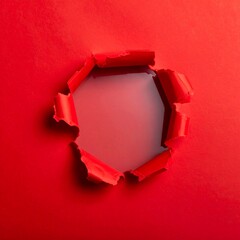 Red paper with a hole