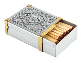 Ornate silver matchbox with gold accents holding wooden matches