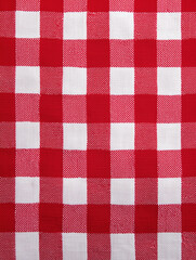 Top view of white and red checkered picnic mat.