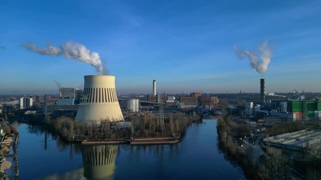 Hard Coal power plant cooling tower emitting steam. Best aerial view drone