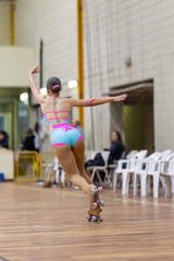 Artistic roller skater performing dynamic balance on one skate