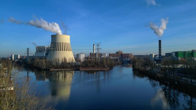 Hard Coal power plant cooling tower emitting steam. Great aerial view drone