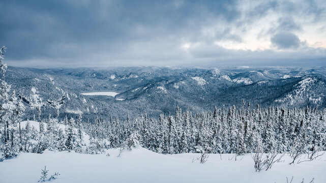 Majestic winter landscape from Pioui trail in Grands-jardins national park on a wonderful snowy day, Charlevoix, Quebec, Canada