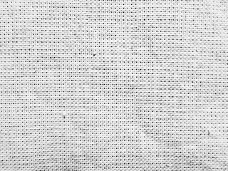 closeup white woven fabric texture intricate weave pattern abstract neutral background for digital wallpaper or banner with copy space