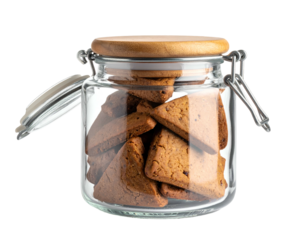 A glass jar filled with triangular cookies and a wooden lid