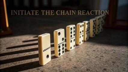 Dominoes in a row creating a chain reaction on a surface