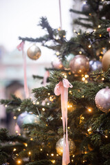 Christmas trees decorated with Christmas balls on the city streets
