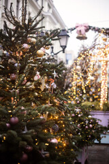 Christmas trees decorated with Christmas balls on the city streets
