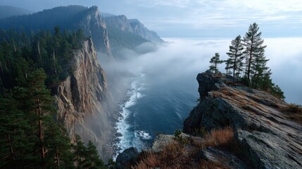 Dramatic cliffs Overlooking Lake Baikal shrouded in morning sea fog creating a beautiful nature scene with rocky terrain and evergreen trees