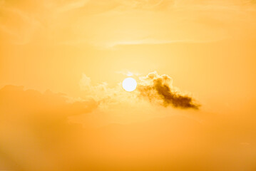 Beautiful orange sunrise sky over the sea horizon. Summer golden hour.