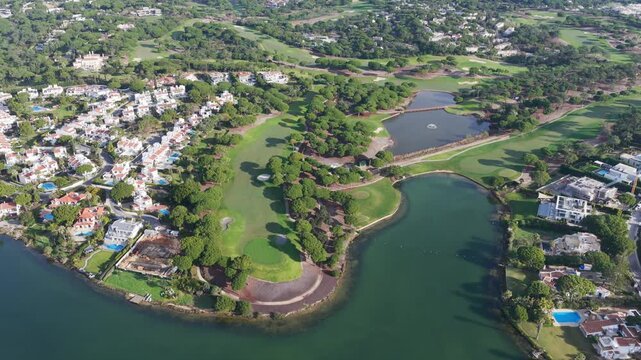 Exclusive Luxury Real Estate at San Lorenzo Golf Course: 4K Aerial View of Palatial Mansions, Private Infinity Pools, and Championship Fairways in Quinta do Lago, Algarve, Portugal