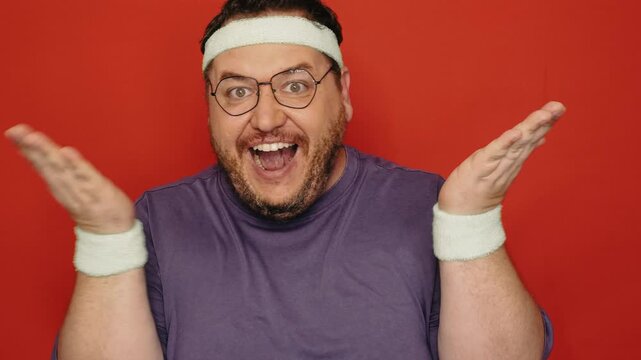 Funny fat man doing fitness.