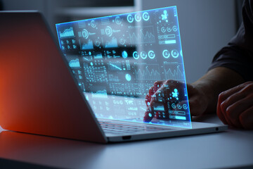 Person using a laptop with a glowing dashboard. Concept of ai data analysis, business process, artificial intelligence, new technology, research in business and innovations in financial markets