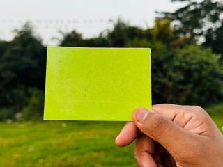 Blank sticky note holding, Hand note for copyspace, empty hand note for news, Blank hand note placeholder